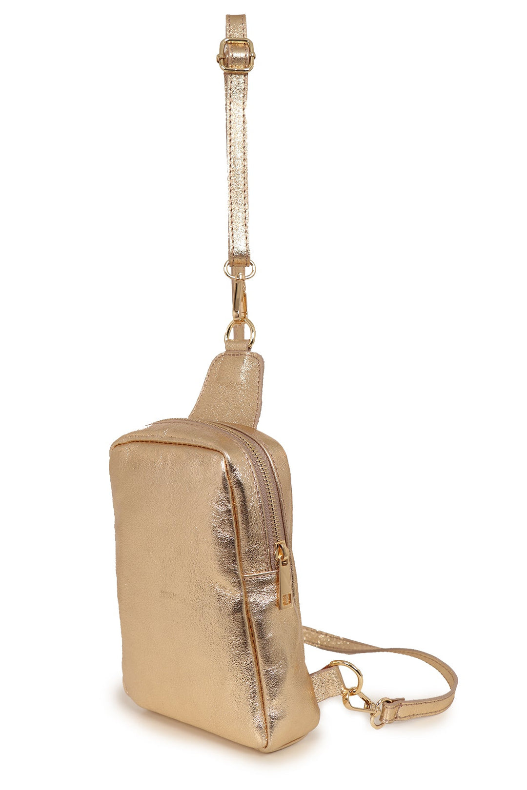 close up of the metallic gold leather sling bag, showing the zip closure and gold hardware