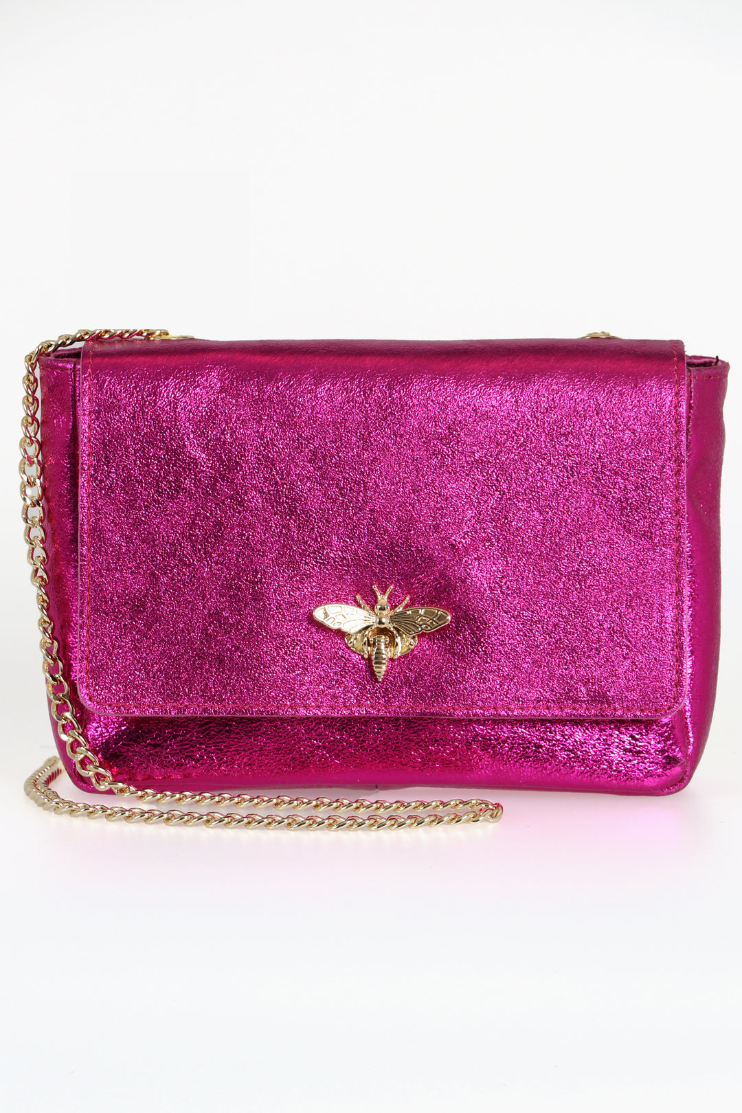 metallic pink leather crossbody bag with a prominent gold bee clasp on the front and a classic cuban link chain strap