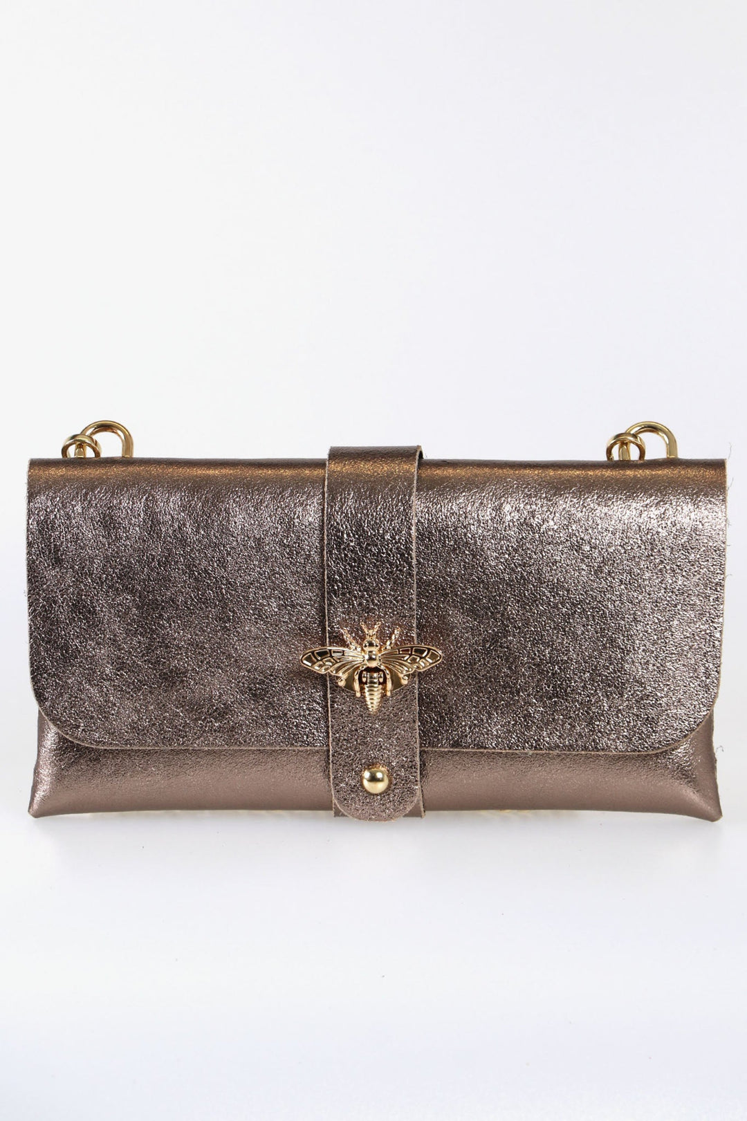 metallic champagne rose gold pink clutch bag with a large bee clasp fastening and a long gold coloured chain strap