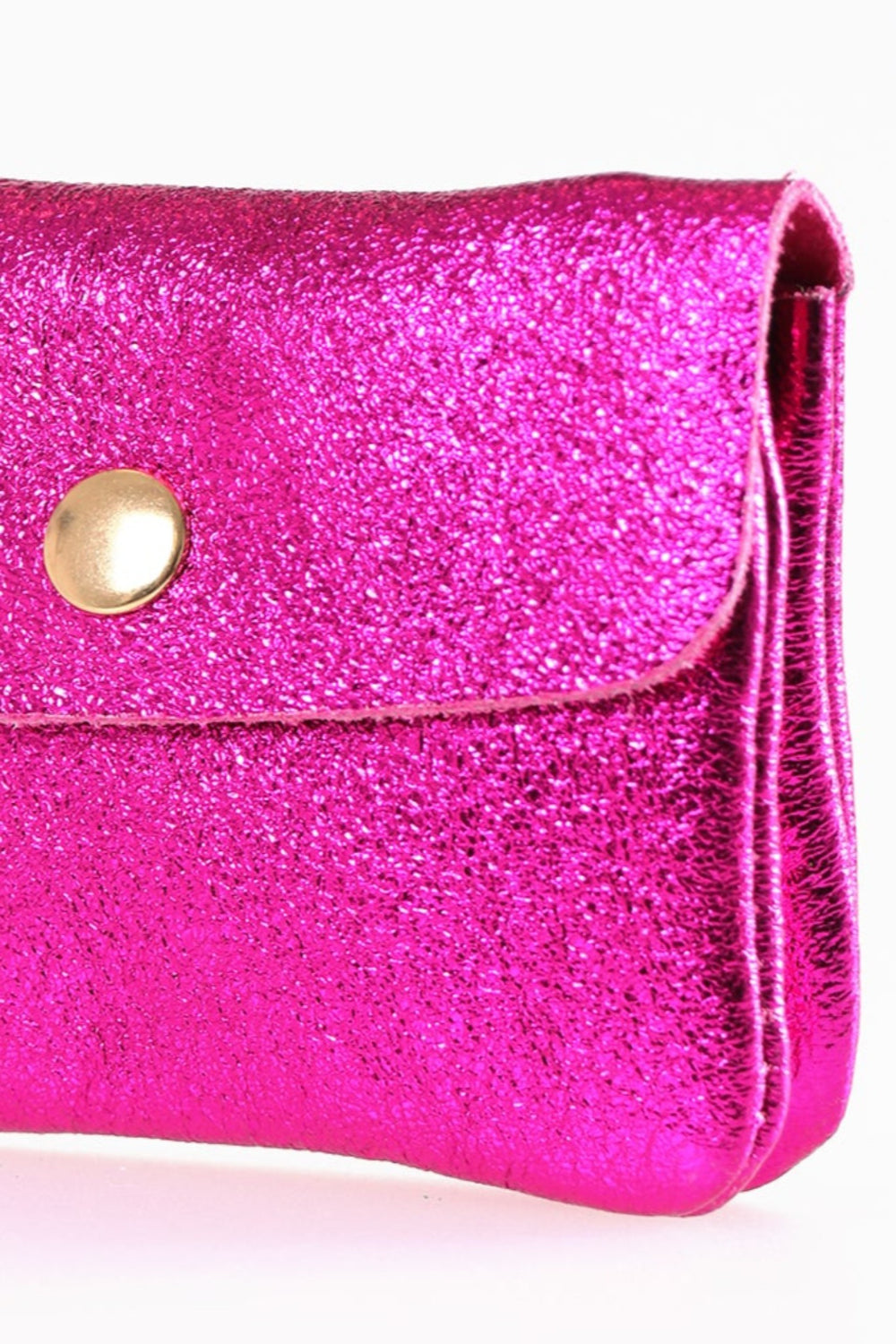 close up of the metallic leather, showing an all over shimmery appearance and vibrant pink colour