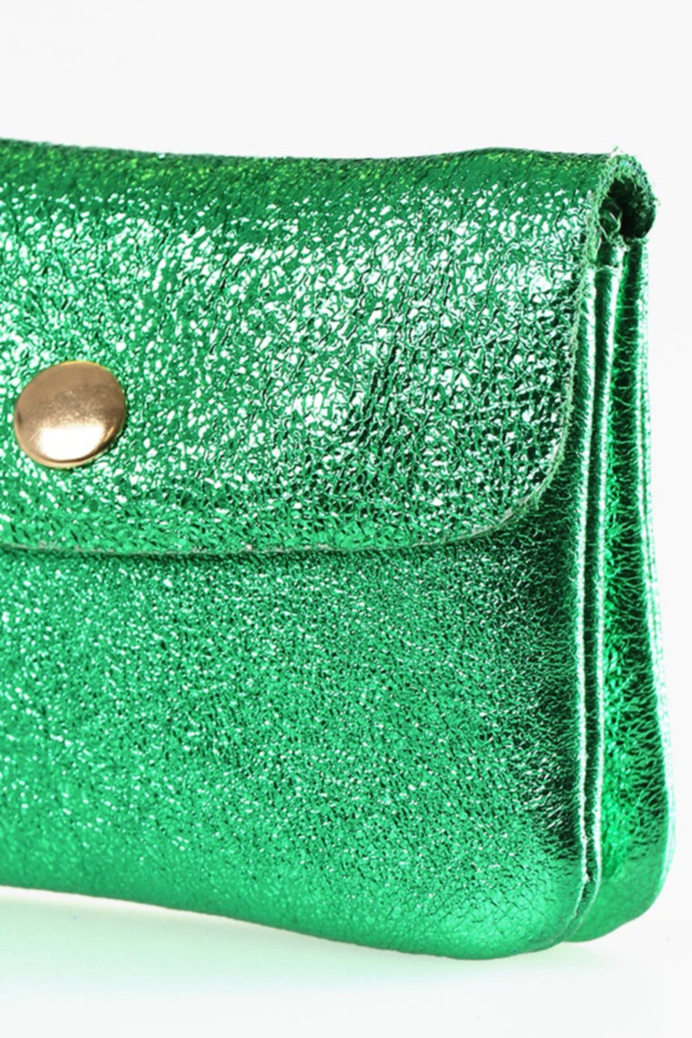 close up of the metallic green leather, the small coin purse has a shiny appearance