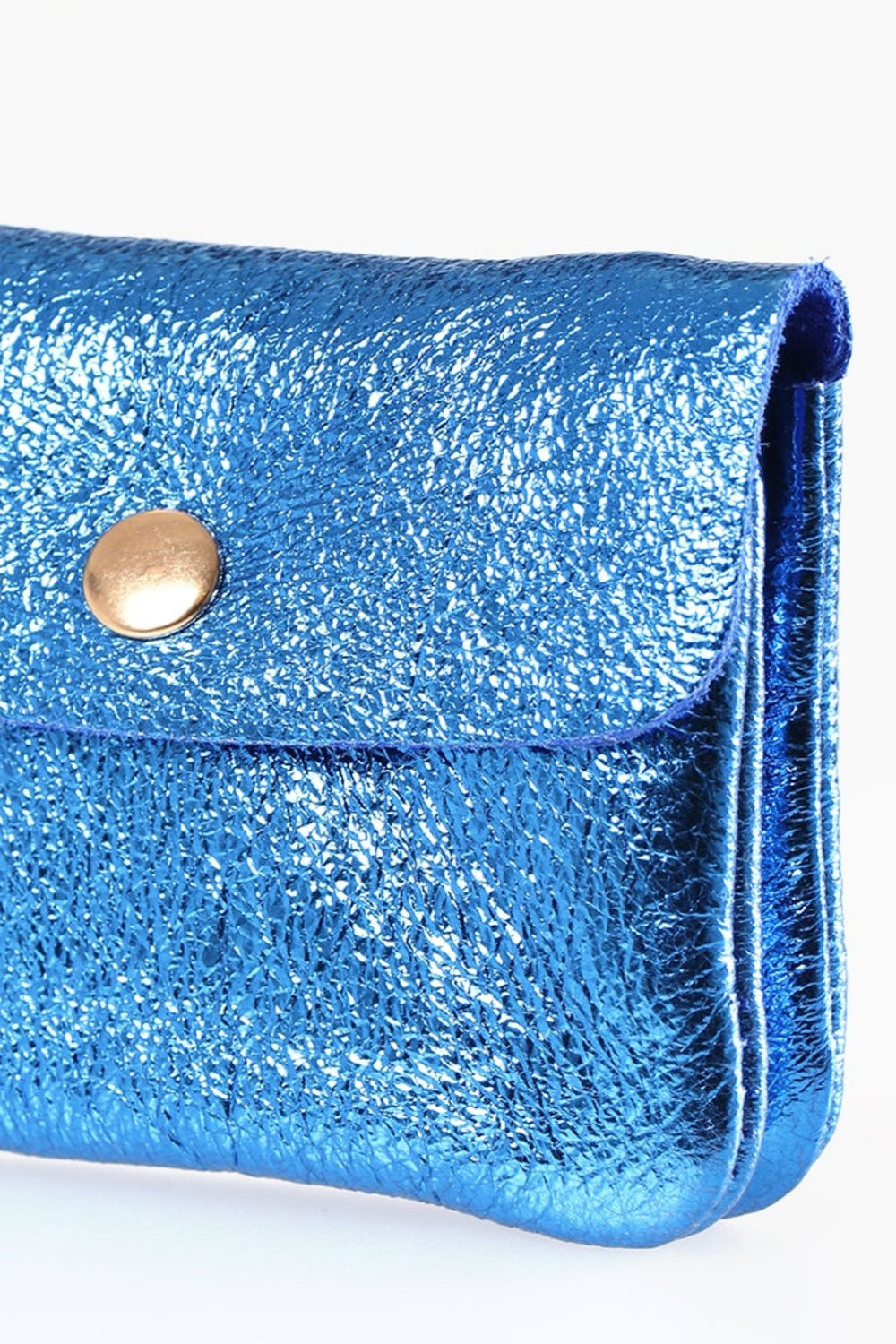 close up of the metallic leather material, the coin purse has a shiny appearance.