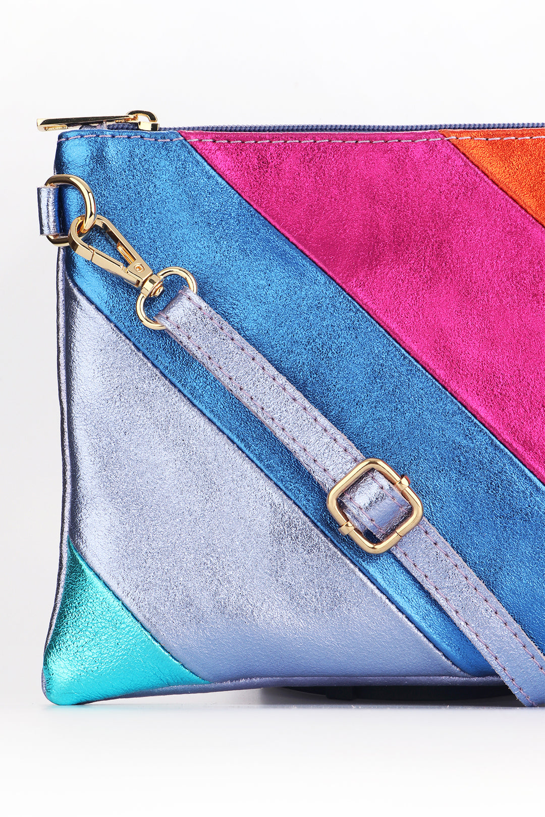 close up of the multicoloured rainbow stripe pattern on the wristlet clutch bag