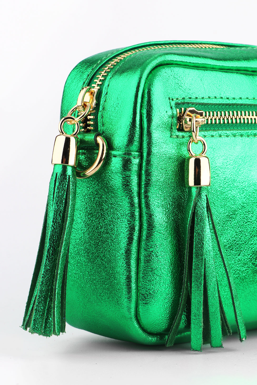 close up of the metallic green genuine leather bag
