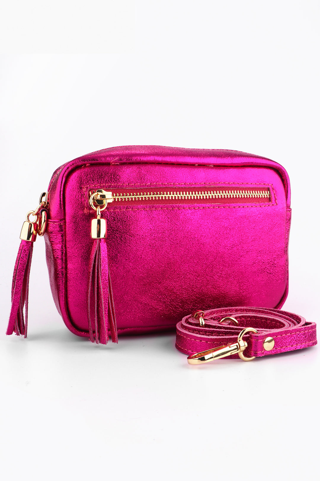 a metallic vibrant pink genuine leather crossbody bag with two zipper compartments