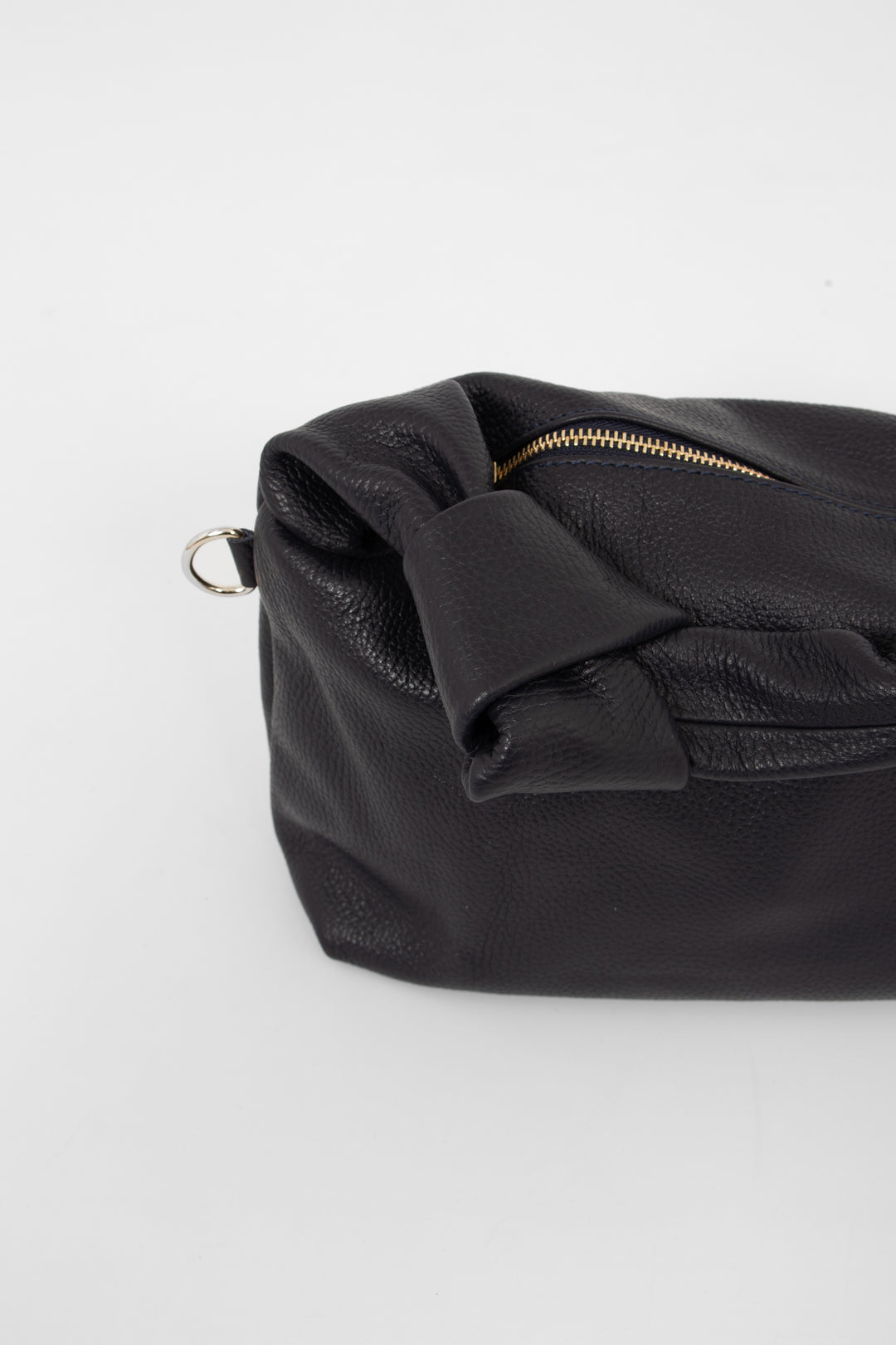 devon-italian-leather-knotted-shoulder-bag-navy-blue-pebbled-close-up-knotted-handle