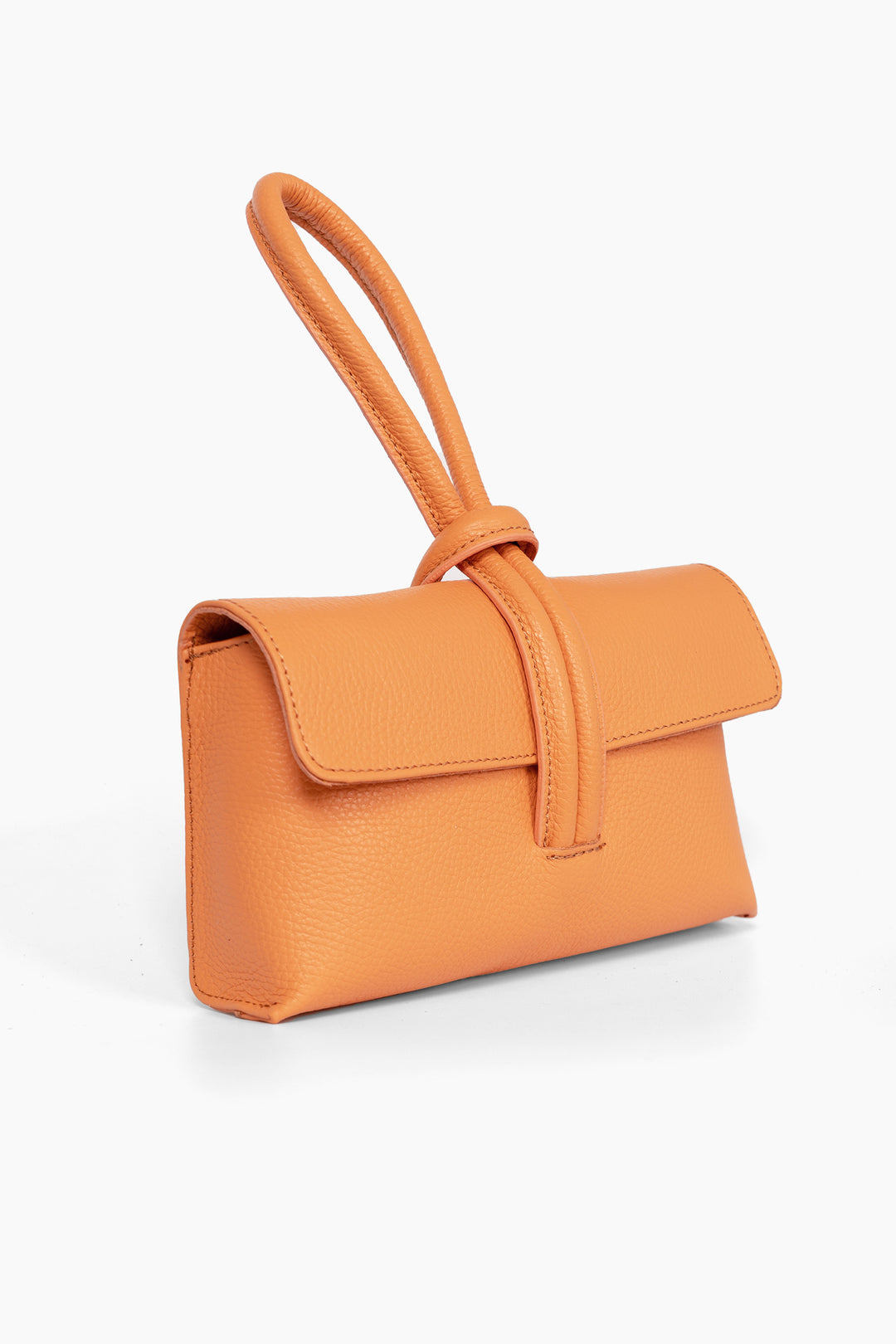 trixie-apricot-pebbled-italian-leather-clutch-bag-side-view-loop-handle