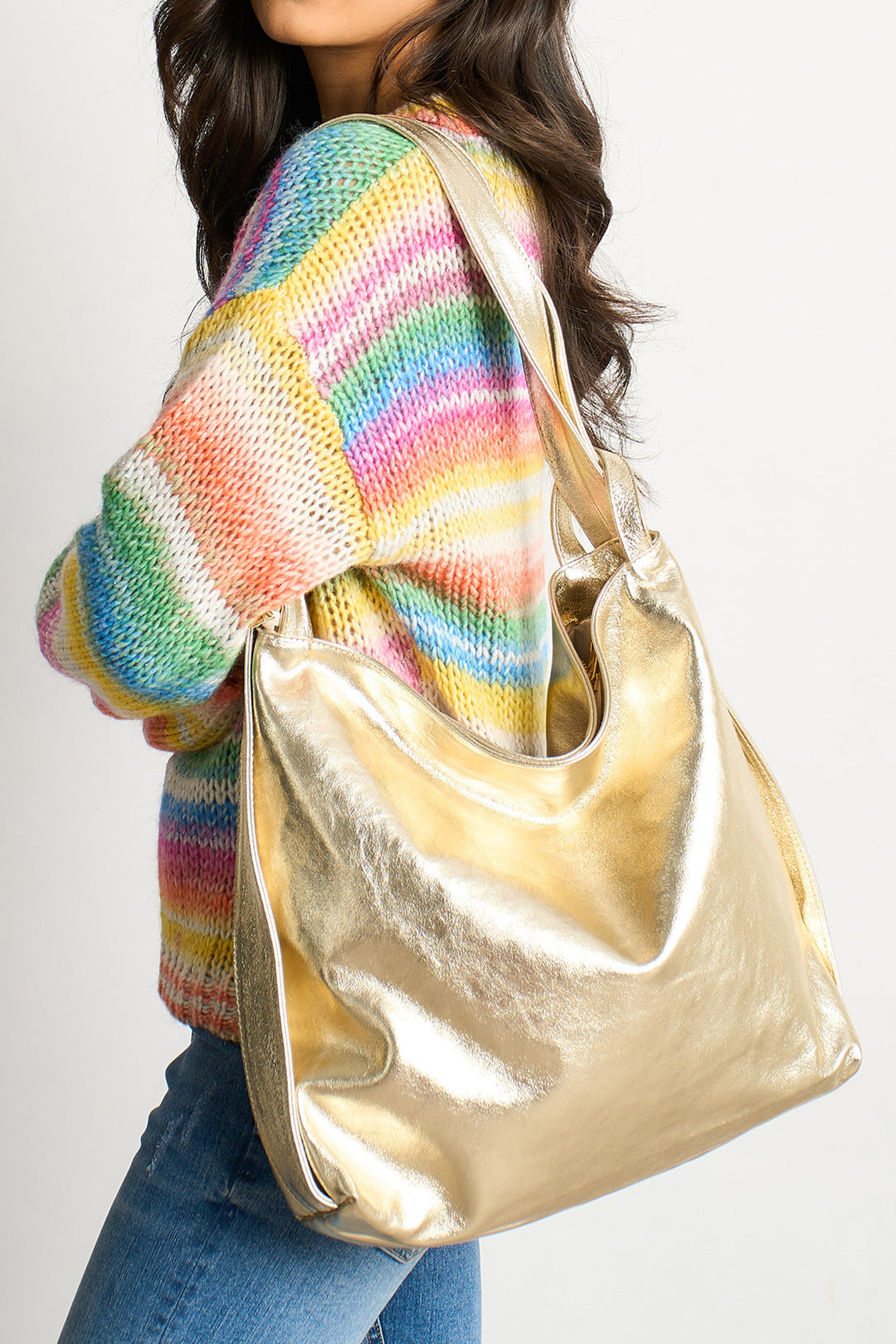 2-in-1-Backpack-Tote-Bag-Metallic-Italian-Leather-in-Gold-Worn-as-Tote
