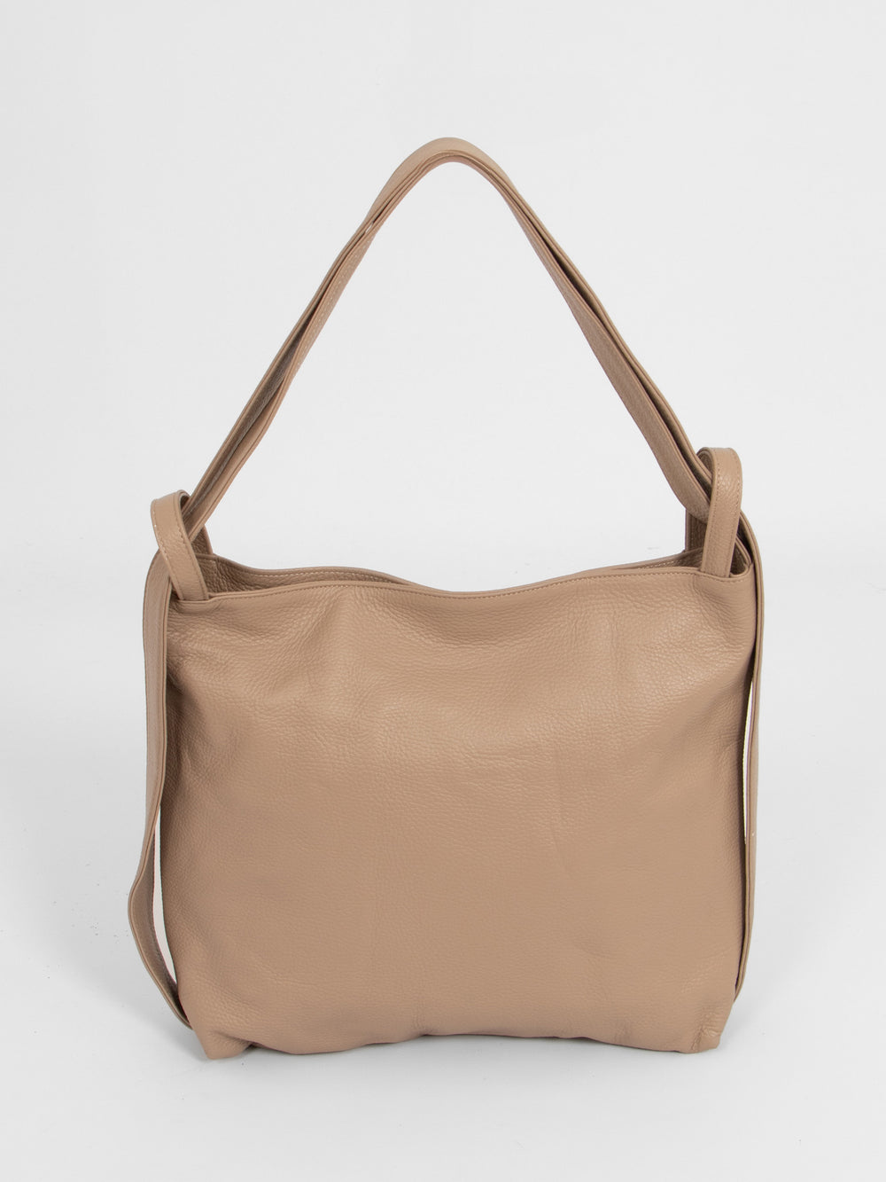 taupe leather convertible backpack tote bag. the strap can be repositioned to allow the bag to be worn as a back pack or over the shoulder