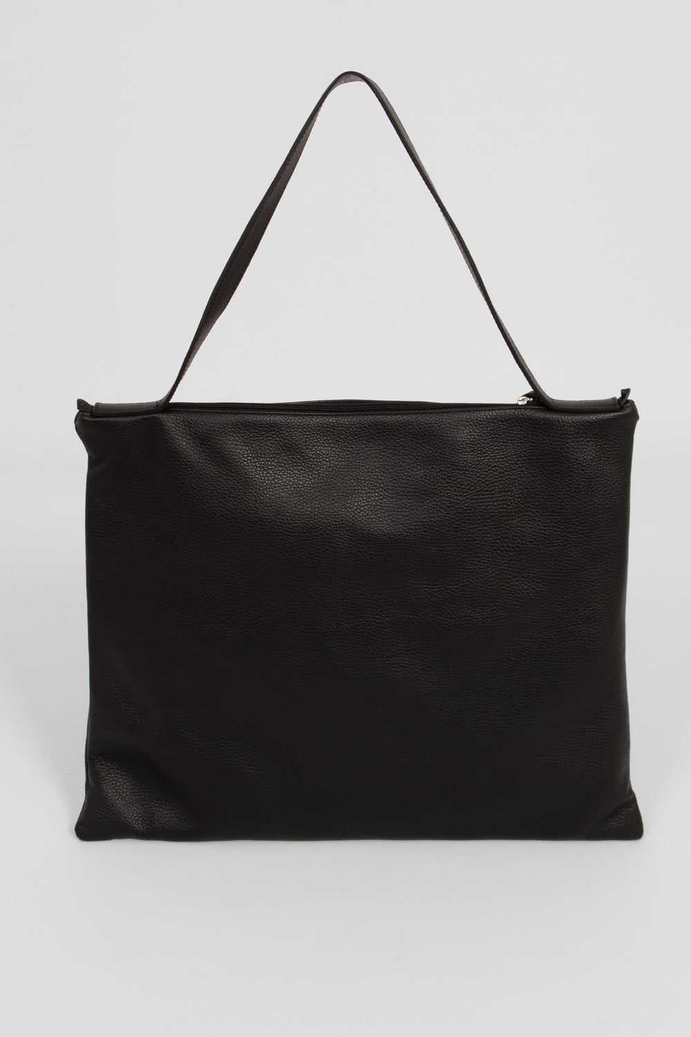 showing the back of the tote bag, the bag is made from pebbled black leather