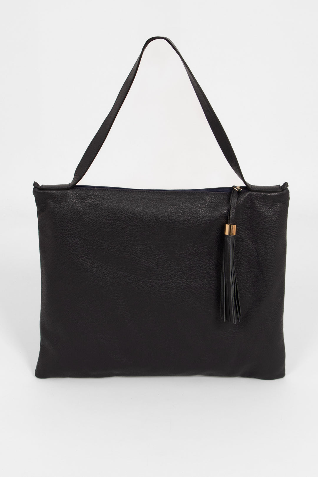 large navy blue leather tote bag with a shoulder strap on the top of the bag and a decorative tassel on the front