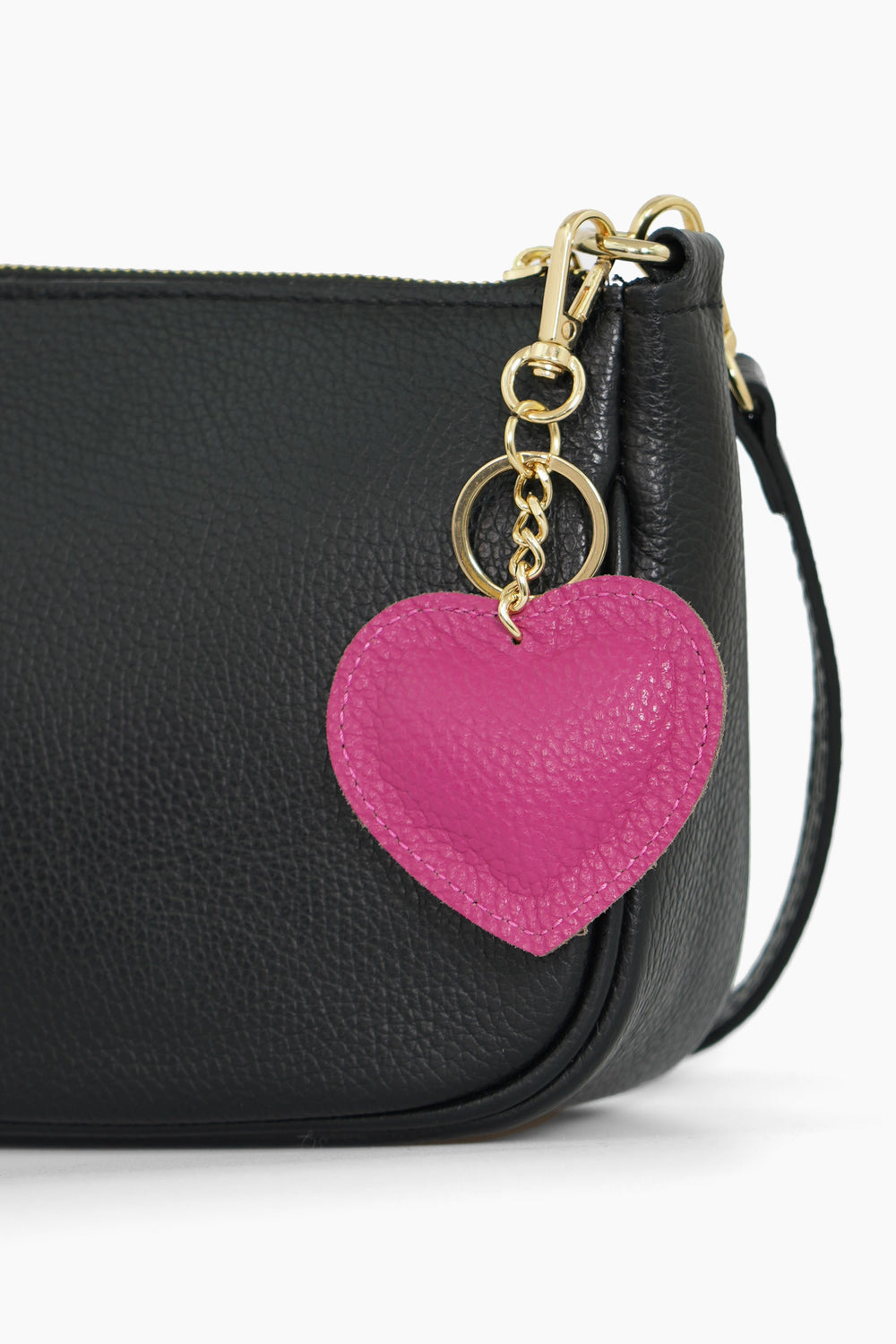 valentina-italian-leather-love-heart-keyring-raspberry-pebbled-clipped-on-to-a-bag