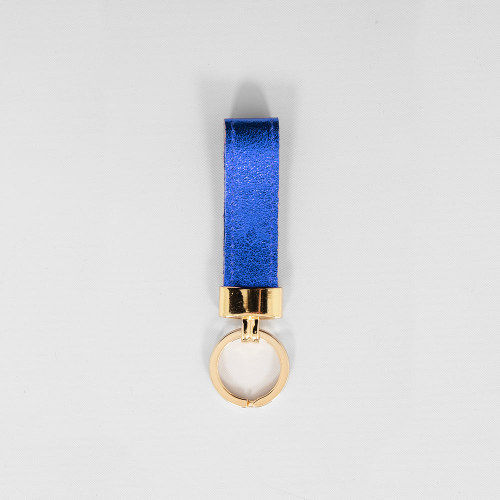 metallic blue leather loop keyring with a gold loop attachment. 