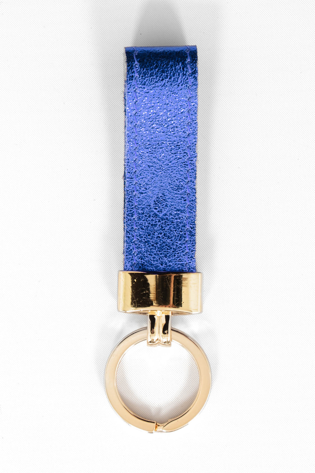 metallic blue leather loop keyring with a gold loop attachment. 