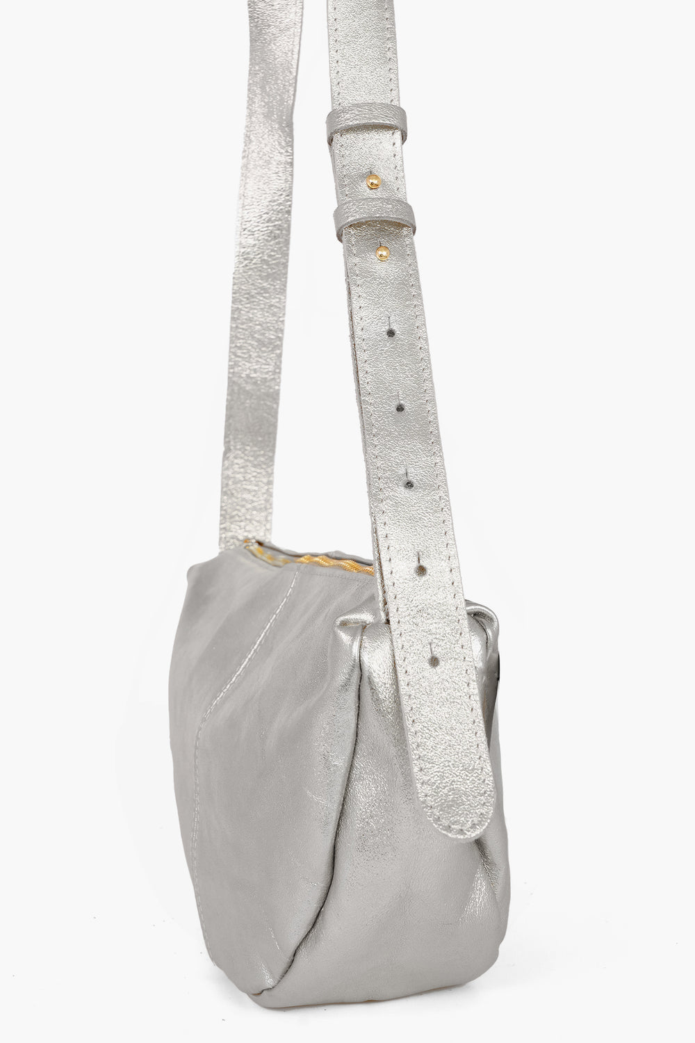 Half-Moon-Crossbody-Bag-Metallic-Italian-Leather-in-Silver-Side-Showing-Adjustable-Strap