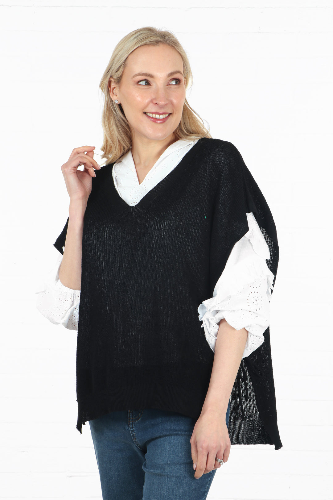 model wearing a black lightweight cotton knitted sweater vest