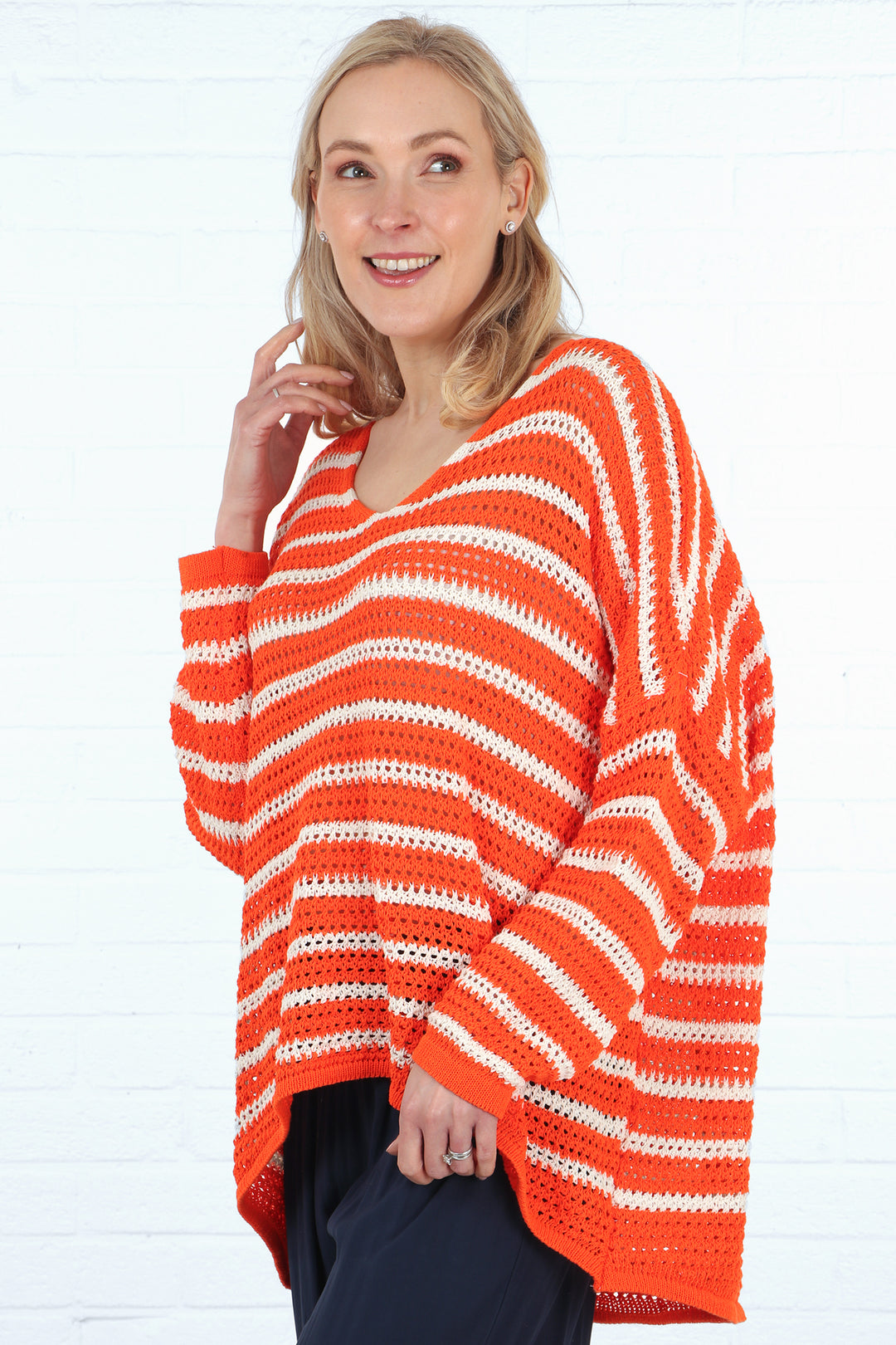 dipped hem open knit orange stripe cotton jumper with a v neck