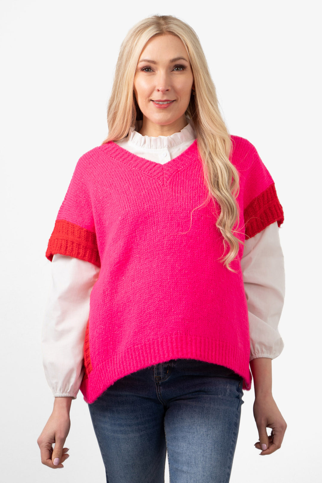 malia-wool-blend-tank-top-fuchsia-red-styled-over-a-long-sleeve-white-shirt-and-paired-with-blue-jeans