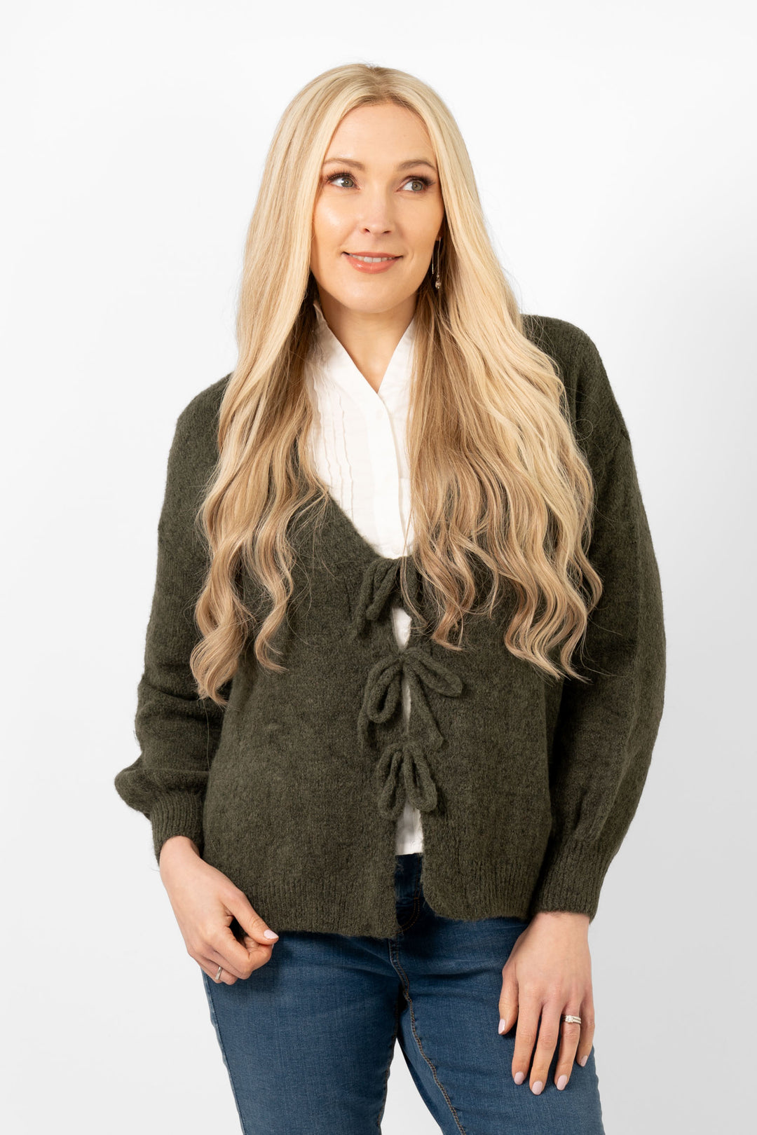 khaki green front tie cardigan being worn on a model. the cardigan has long sleeves and three ties at the front.