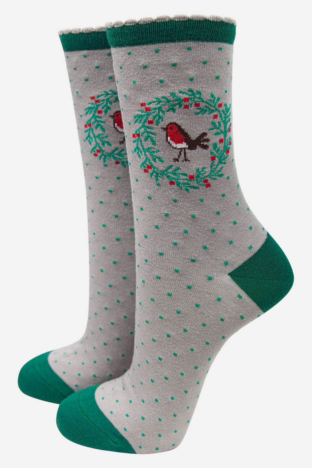 grey socks with green heel, toe and cuff, featuring a red robin bird encircled by a holly garland