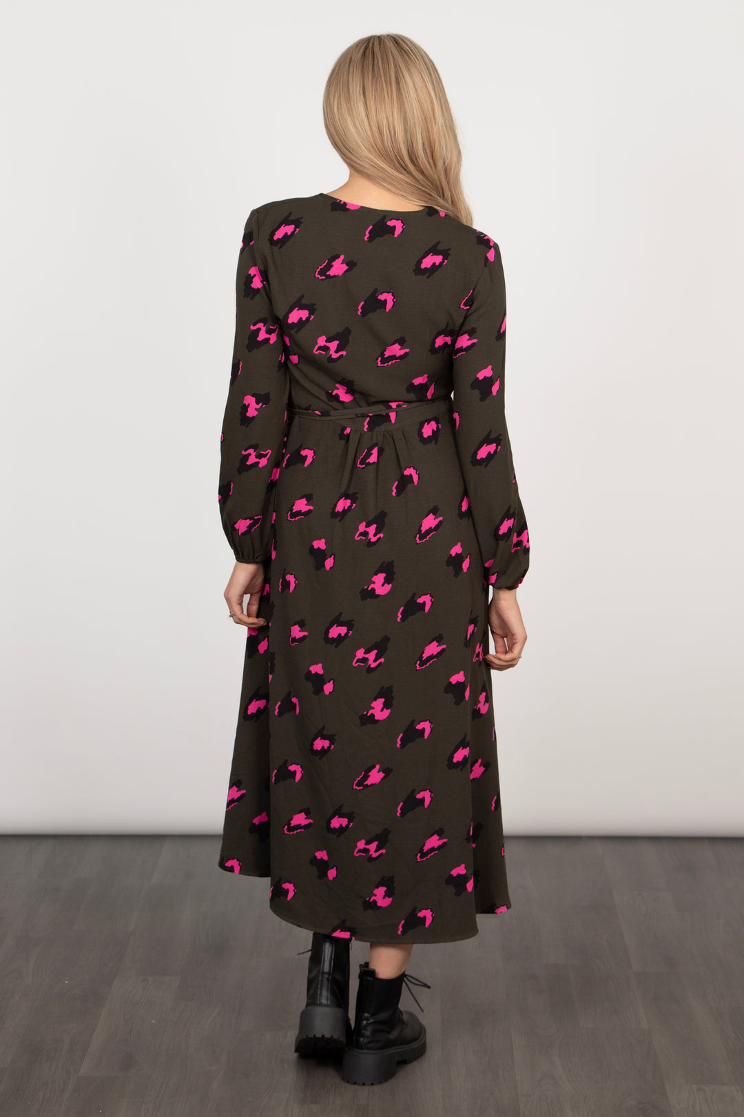 the back of the khaki and pink leopard print wrap dress, showing the all over pattern and waist tie feature.