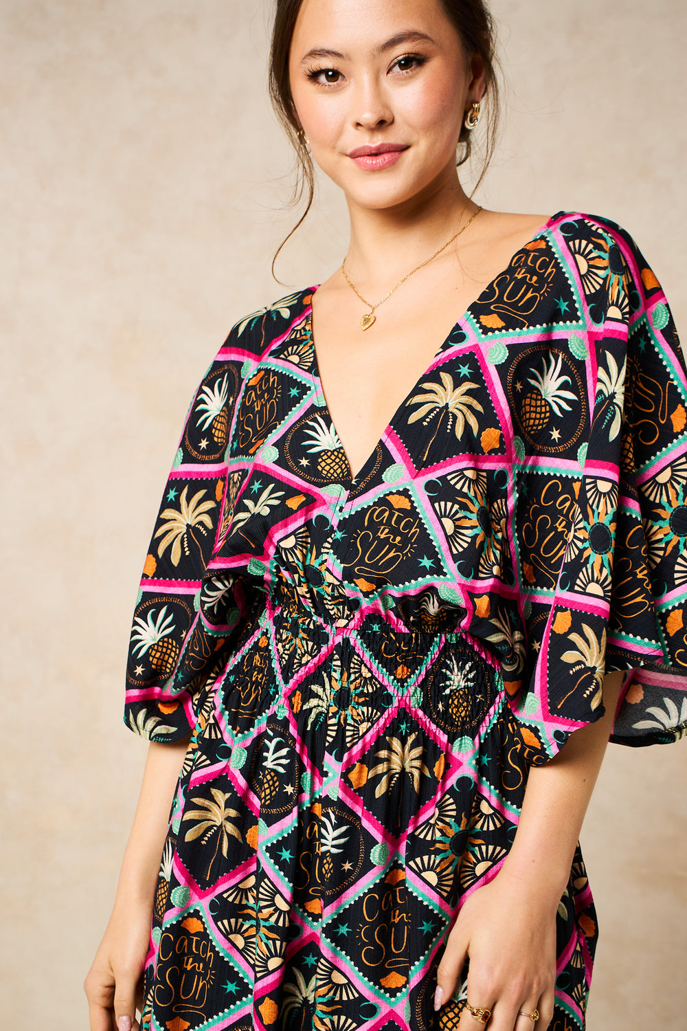 Pineapple-Print-V-Neck-Jumpsuit-in-Black-Close-Up