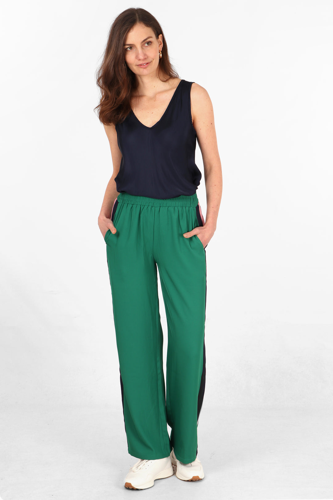 green casual long summer trousers with pockets and an elasticated waist