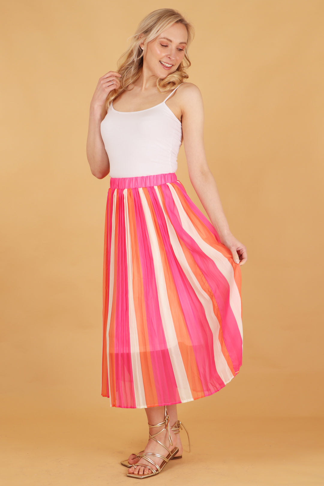 pink and coral striped pleated chiffon skirt with a pink elasticated waist