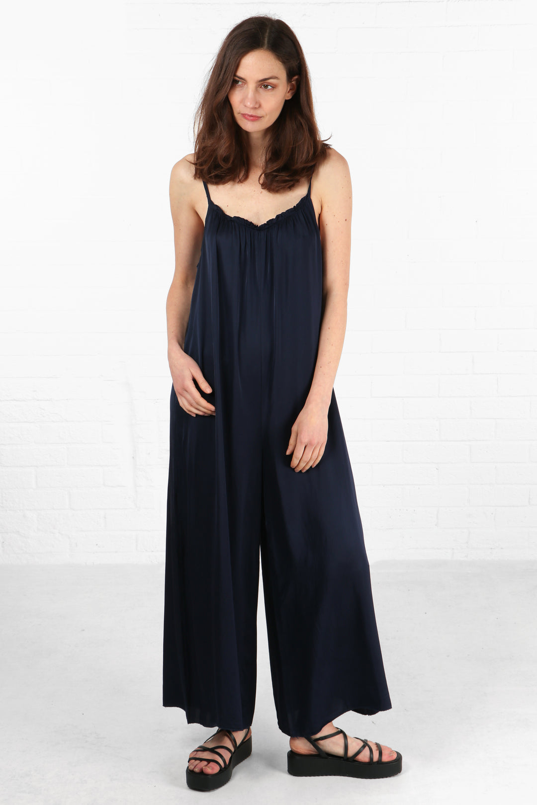 navy blue silky summer jumpsuit with thin spaghetti straps