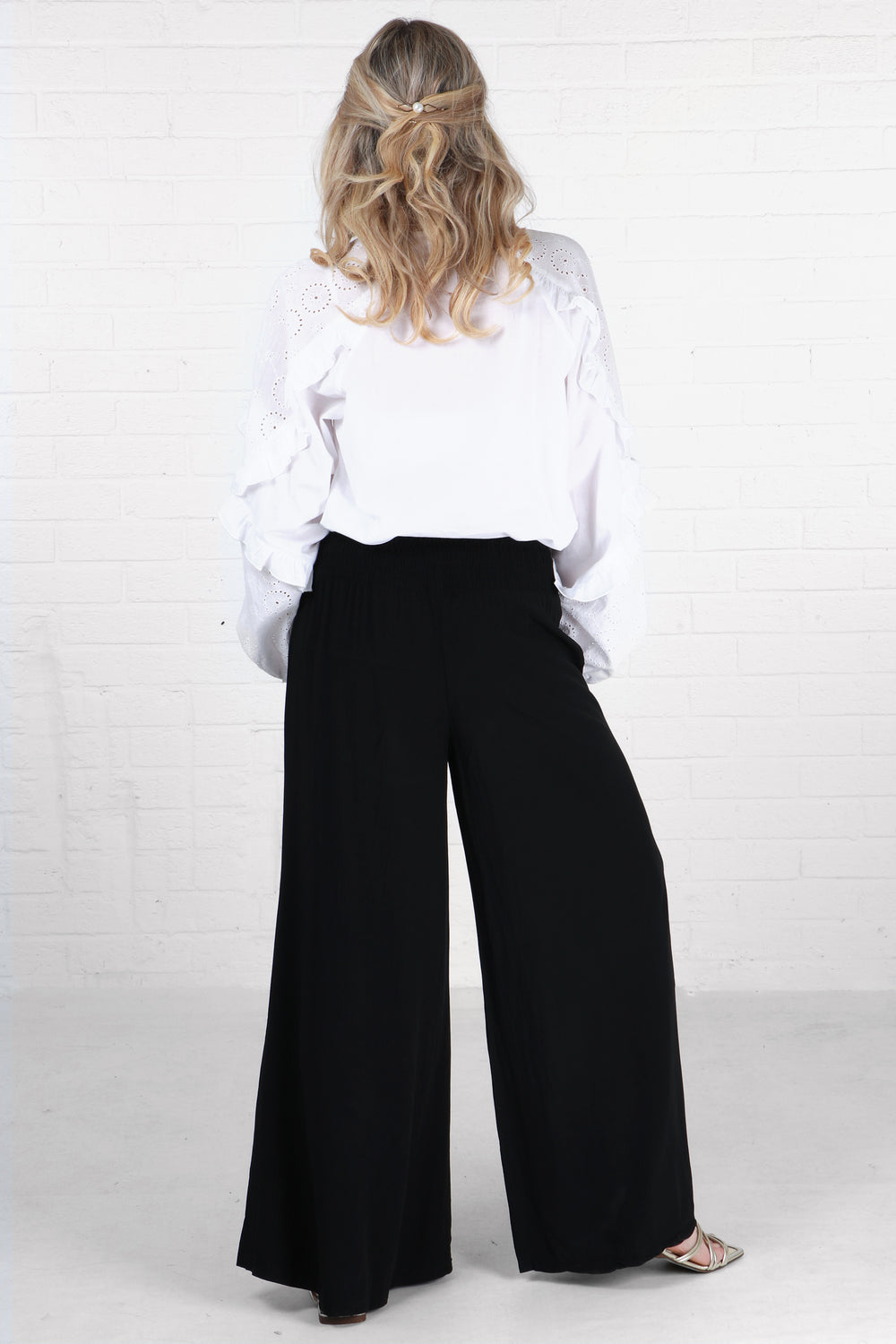 plain black wide leg palazzo pants with an elasticated shirred waist