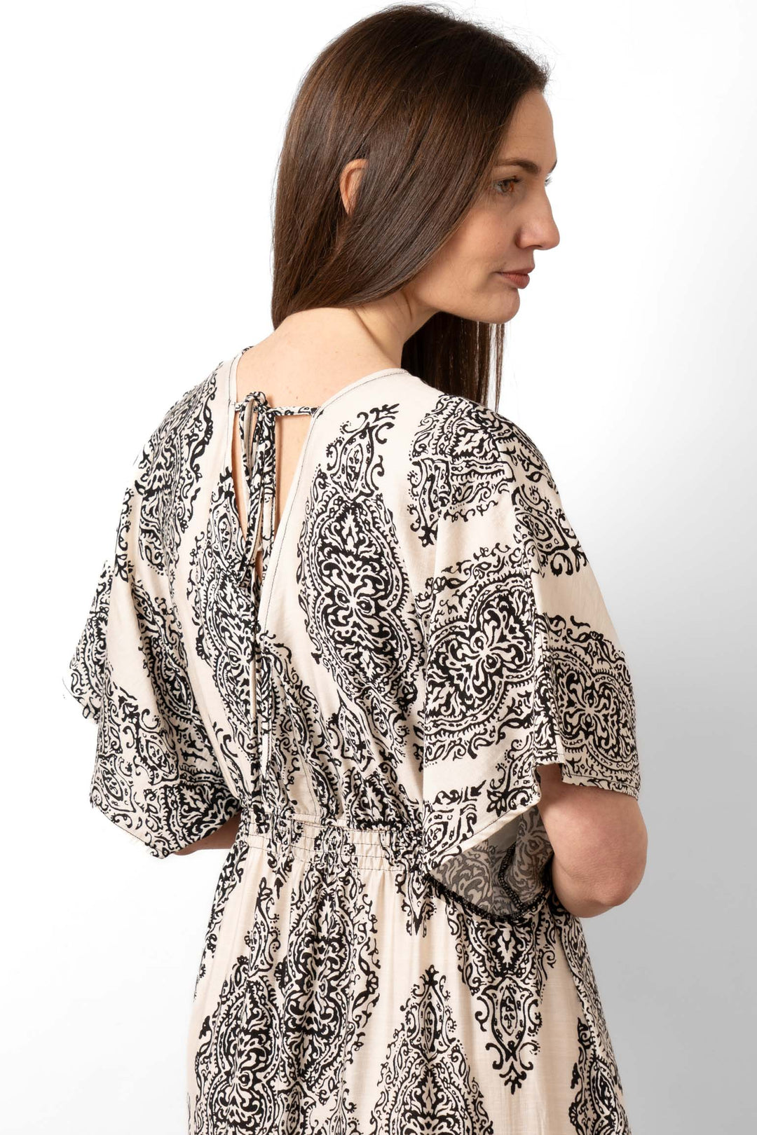 sienna-maxi-kaftan-dress-cream-mandala-print-close-up-neck-tie