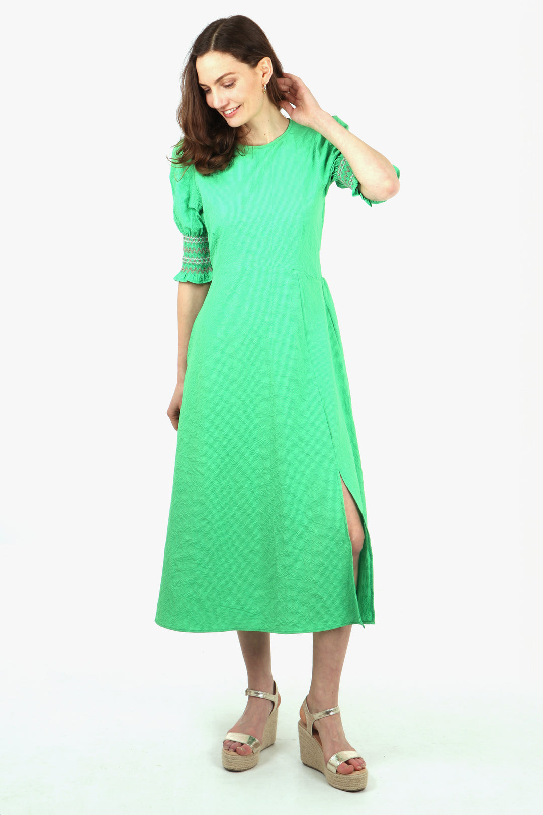 green midi tea dress with shirred 3/4 sleeves and front split