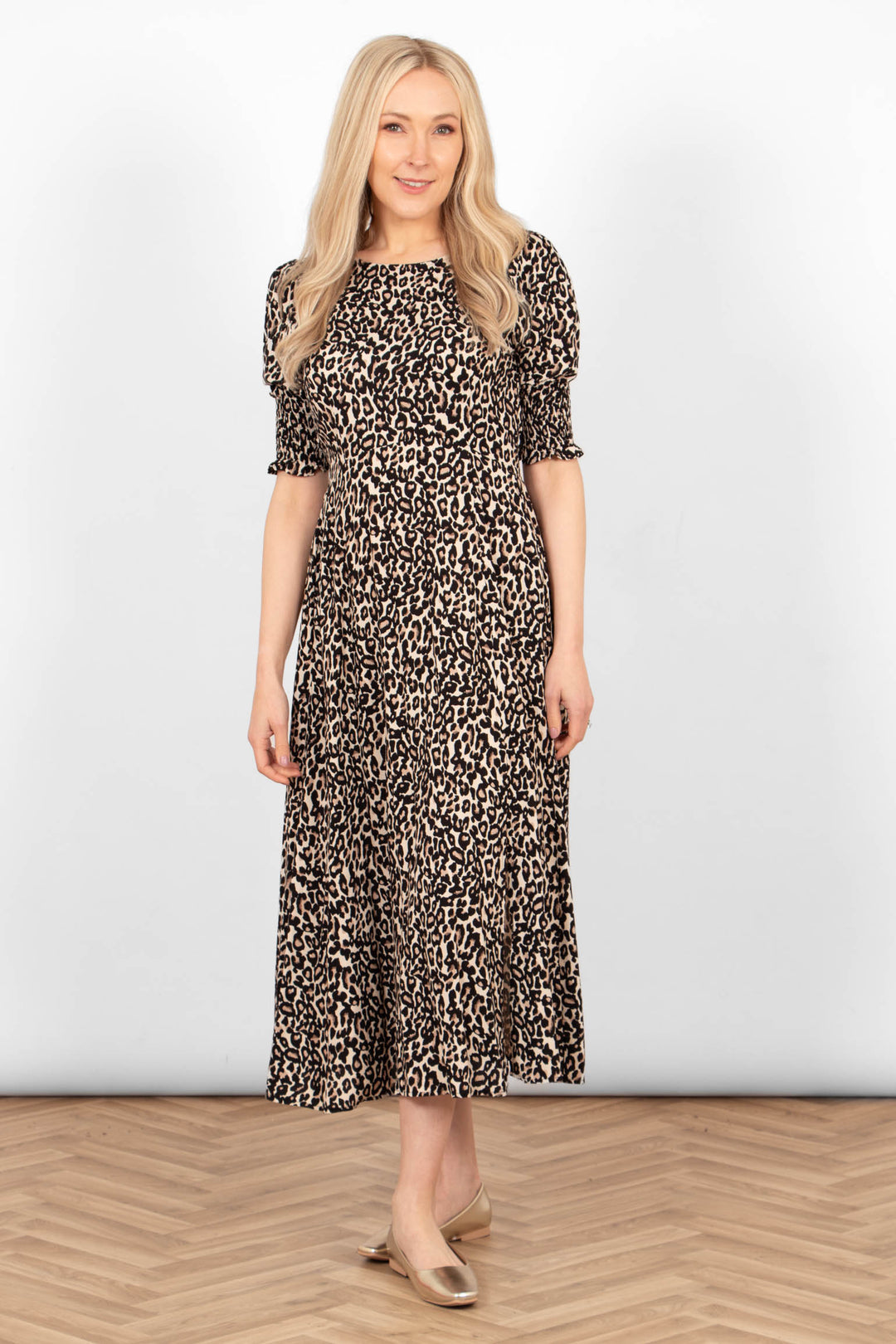 hazel-midi-tea-dress-neutral-leopard-print-model-showing-front-of-the-dress