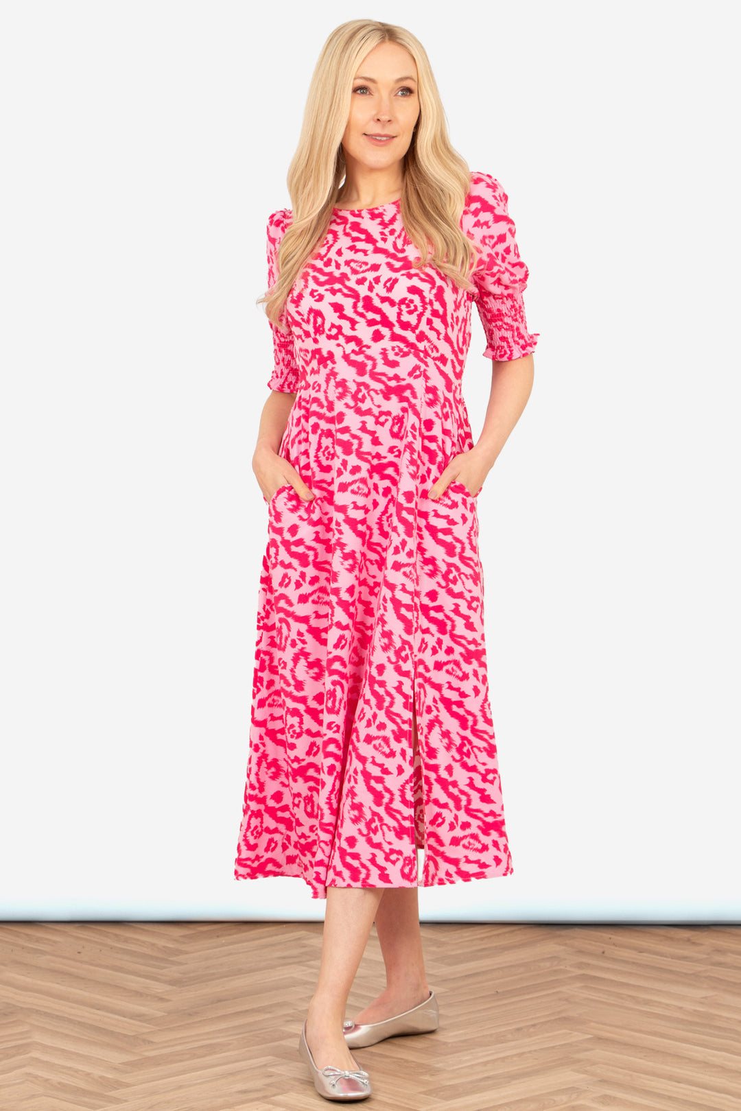 hazel-midi-tea-dress-pink-animal-print-front-view-model