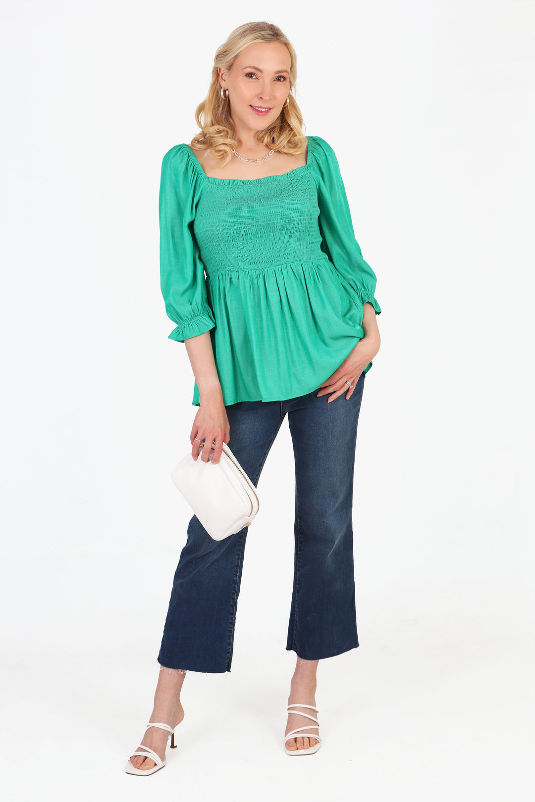 green shirred milkmaid top worn by a model