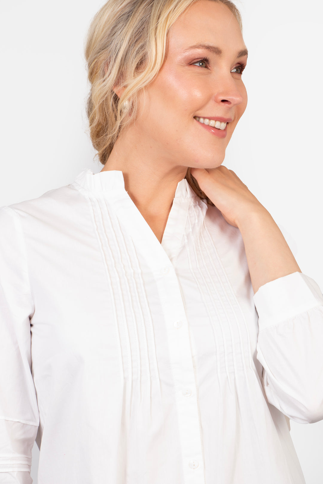 close up of the pleated front on the cotton shirt