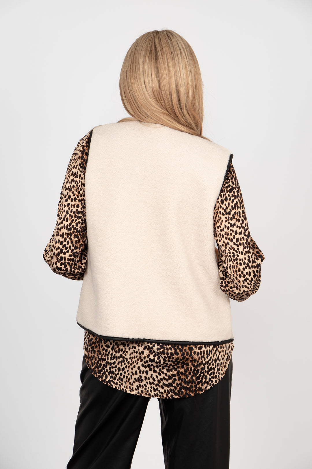 model showing the back of the fleece gilet