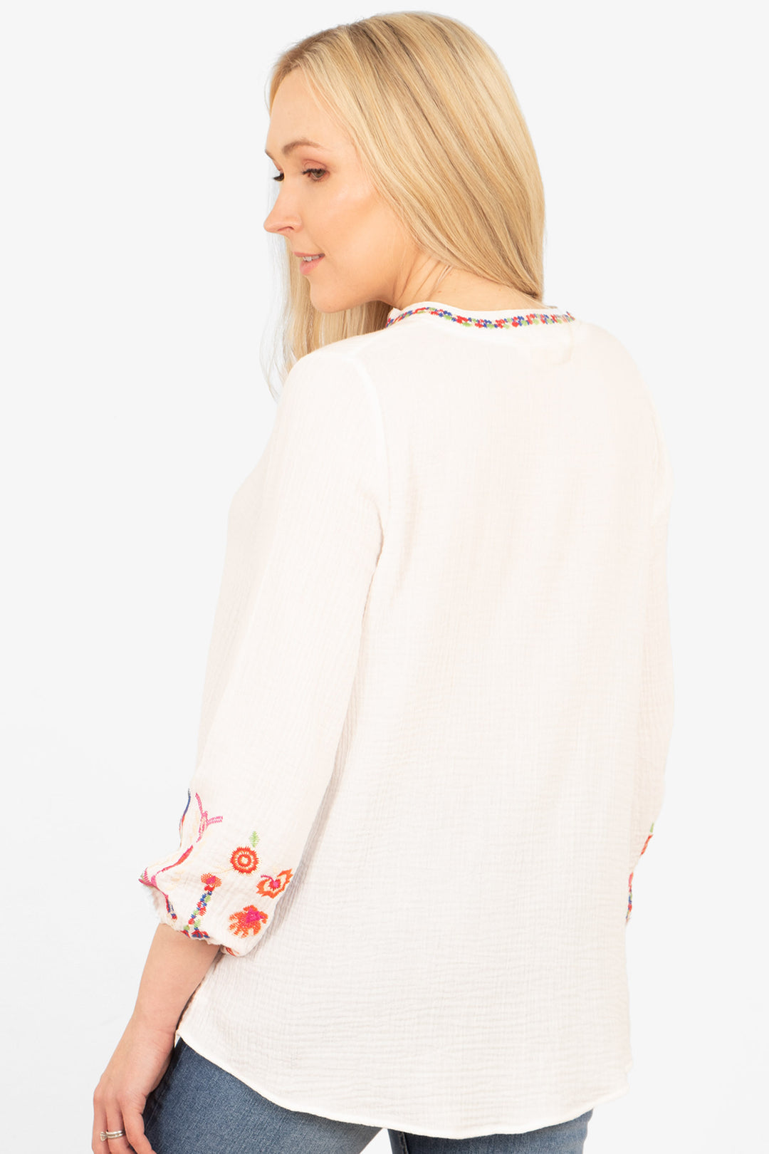 honey-long-sleeve-cotton-blouse-white-floral-embroidery-rear-view-dipped-hem