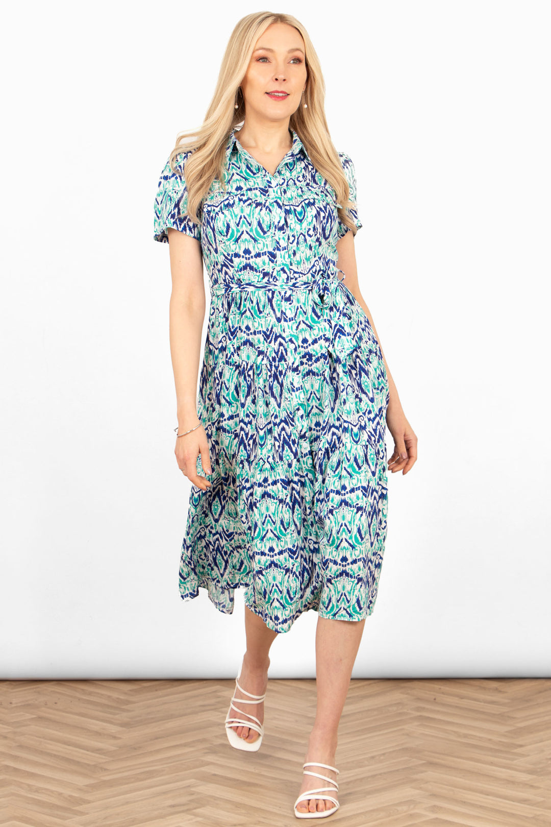 liberty-midi-shirt-dress-blue-aztec-print-styled-on-model-front-view-white-sandals