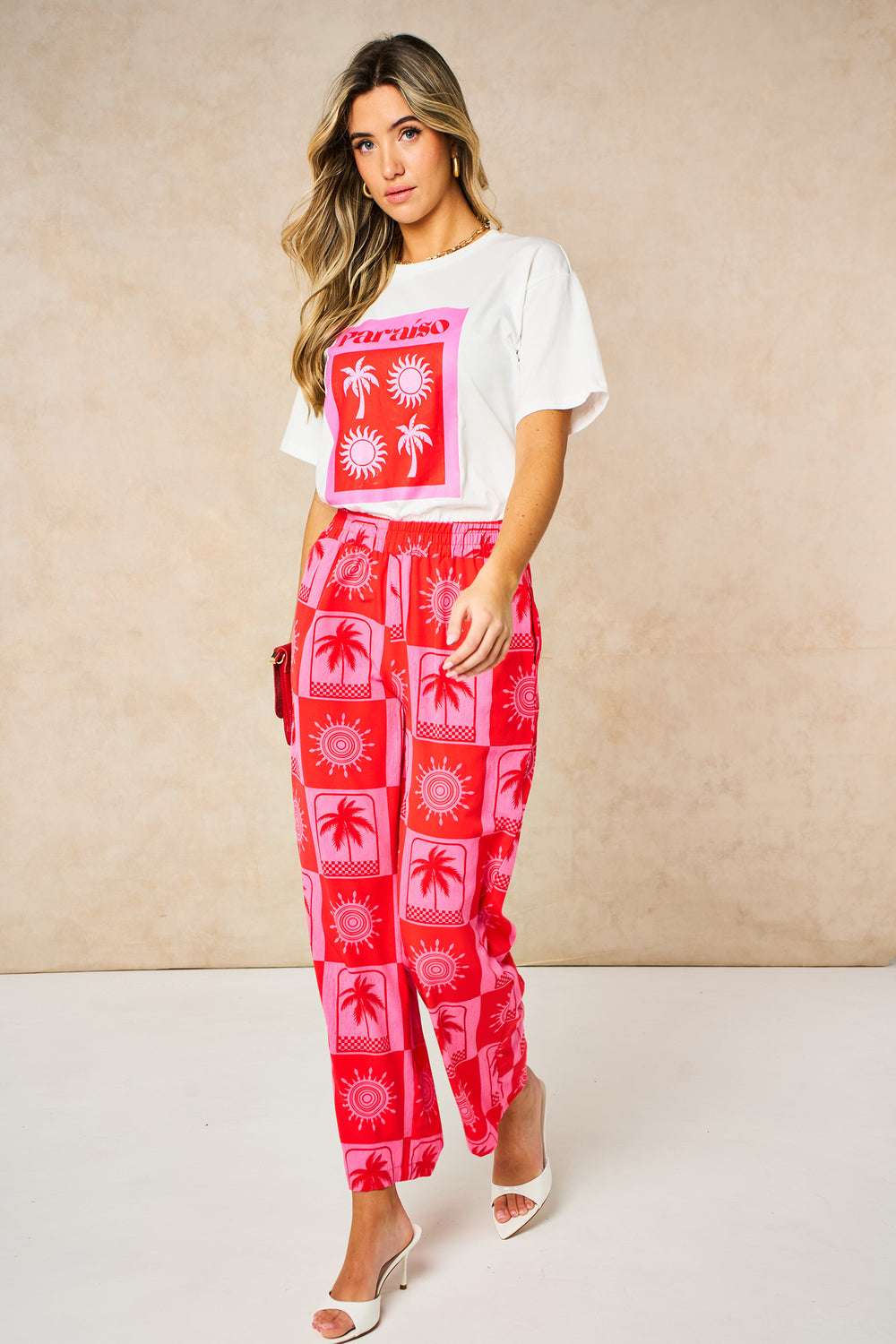 Sun-&-Palm-Tree-Wide-Leg-Trousers-in-Hot-Pink-walk