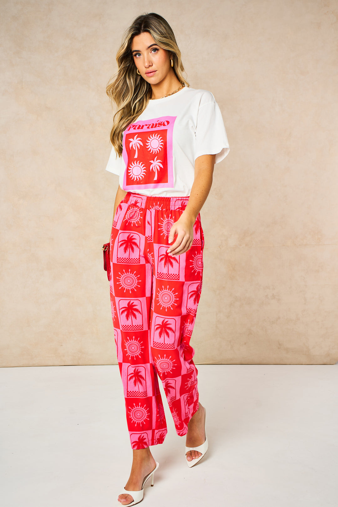 Sun-&-Palm-Tree-Wide-Leg-Trousers-in-Hot-Pink-walk