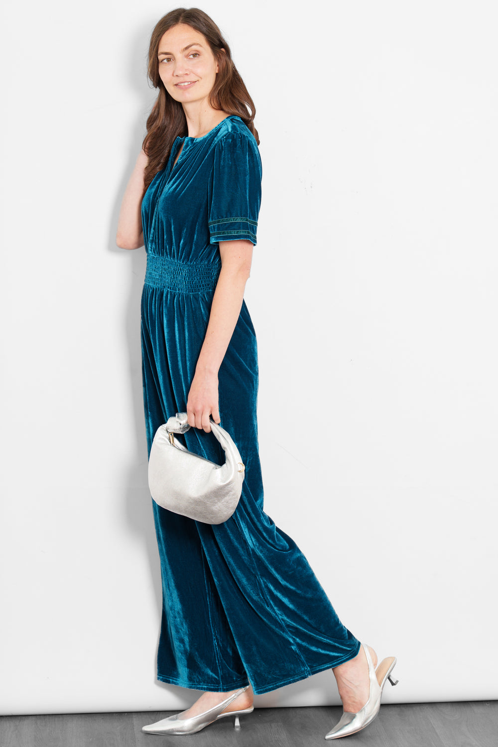 lydia-v-neck-jumpsuit-teal-velvet-styled-evening-bag-heels