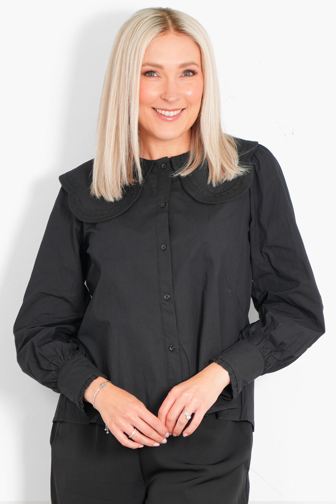 cammie-long-sleeve-cotton-shirt-black-pilgrim-collar-model-front-view
