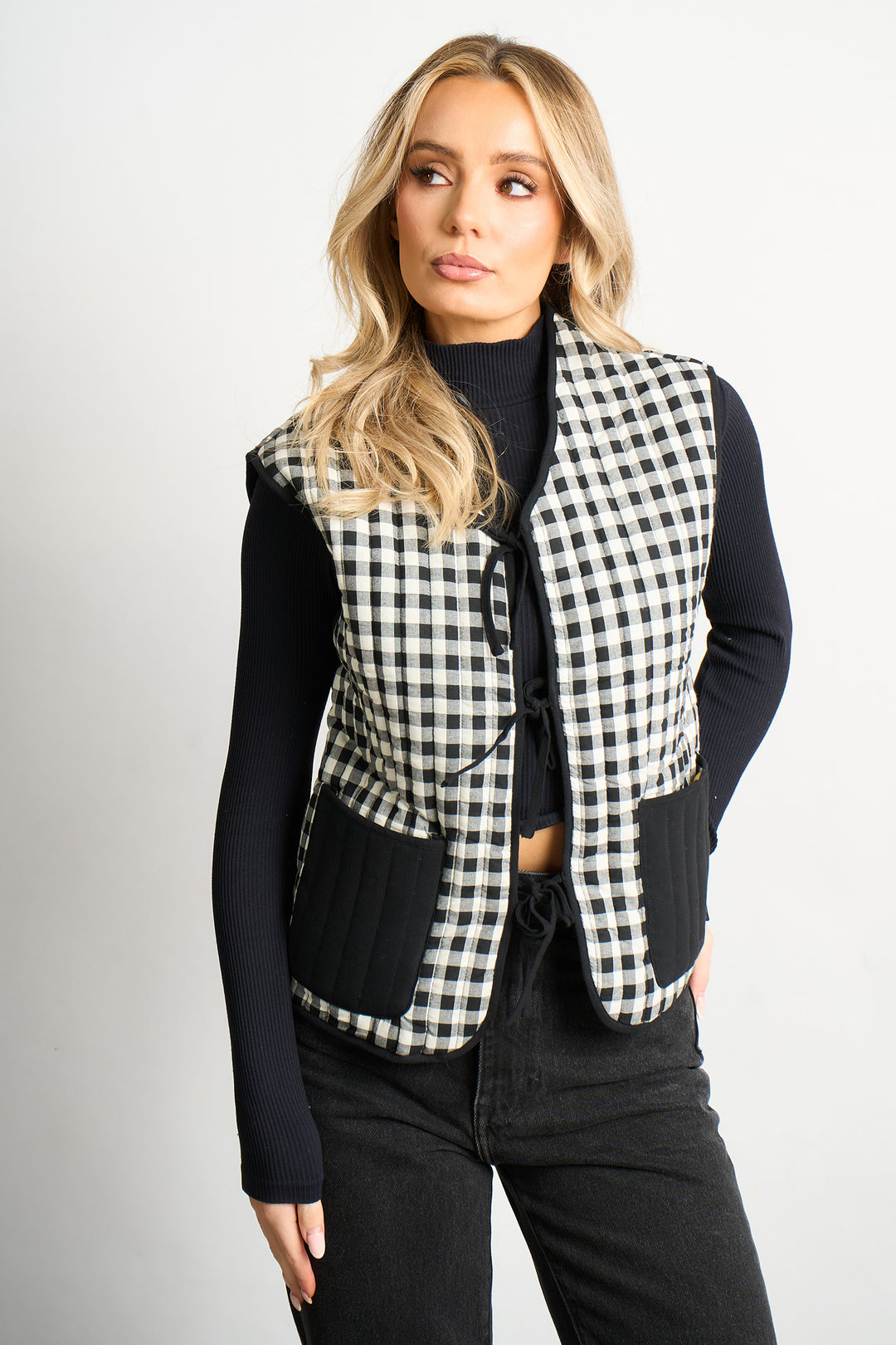 tabby-quilted-reversible-gilet-black-cream-gingham