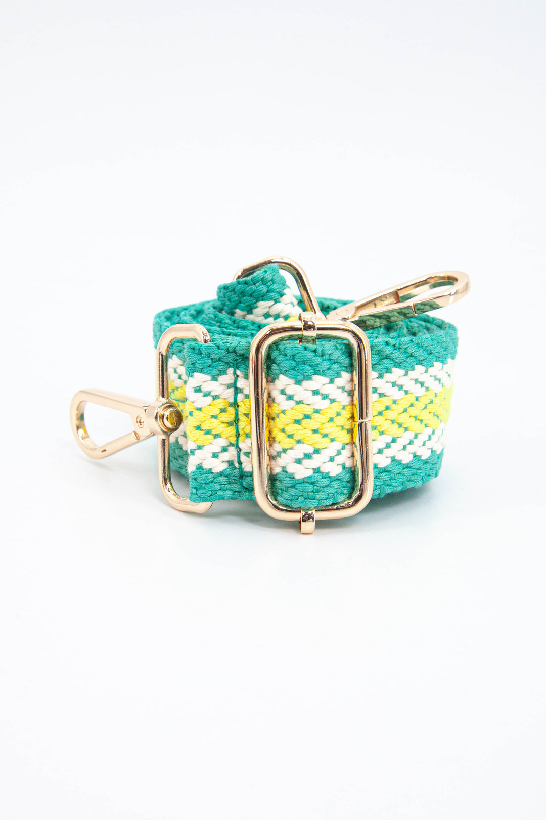 green and yellow striped woven bag strap with gold hardware