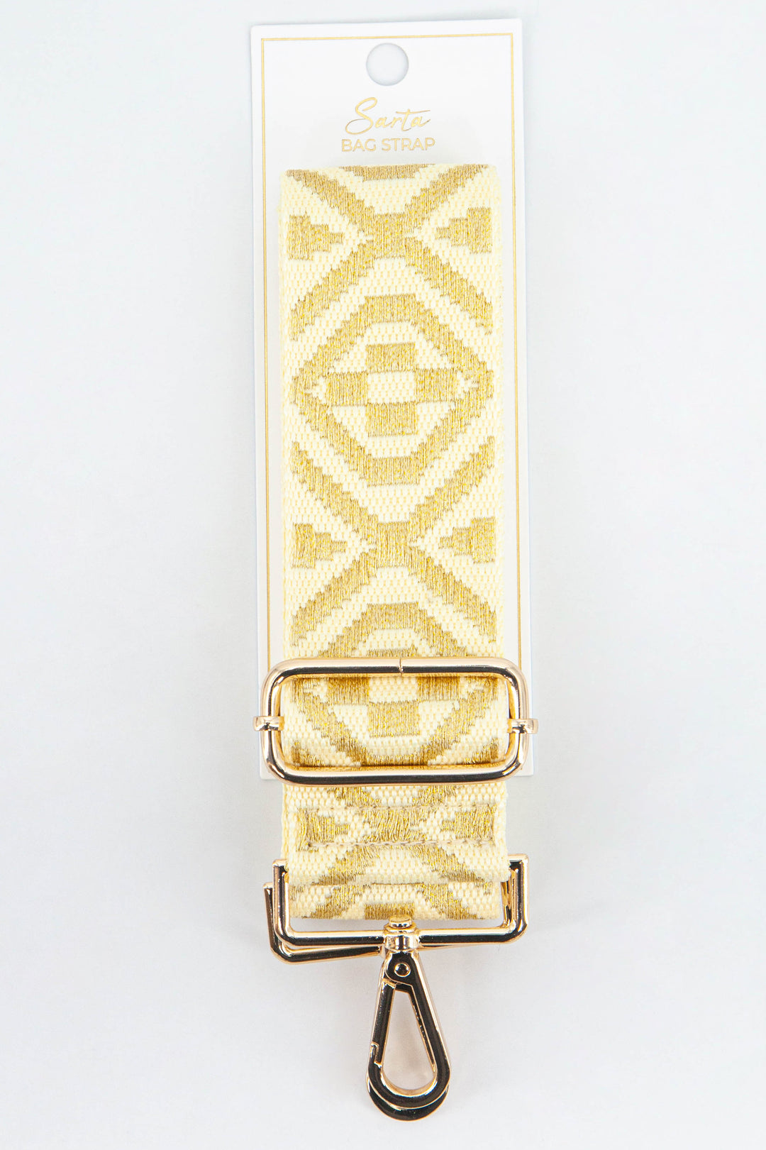 gold ikat pattern woven wide bag strap with gold snap hook attatchments