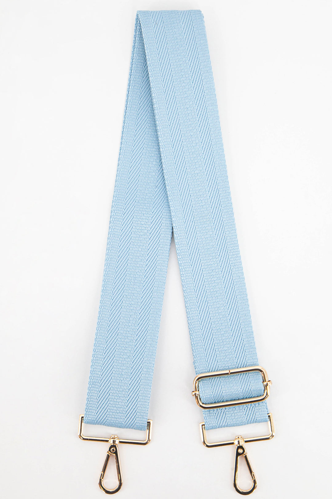 plain light blue clip on bag strap in a textured orange woven material with gold hardware