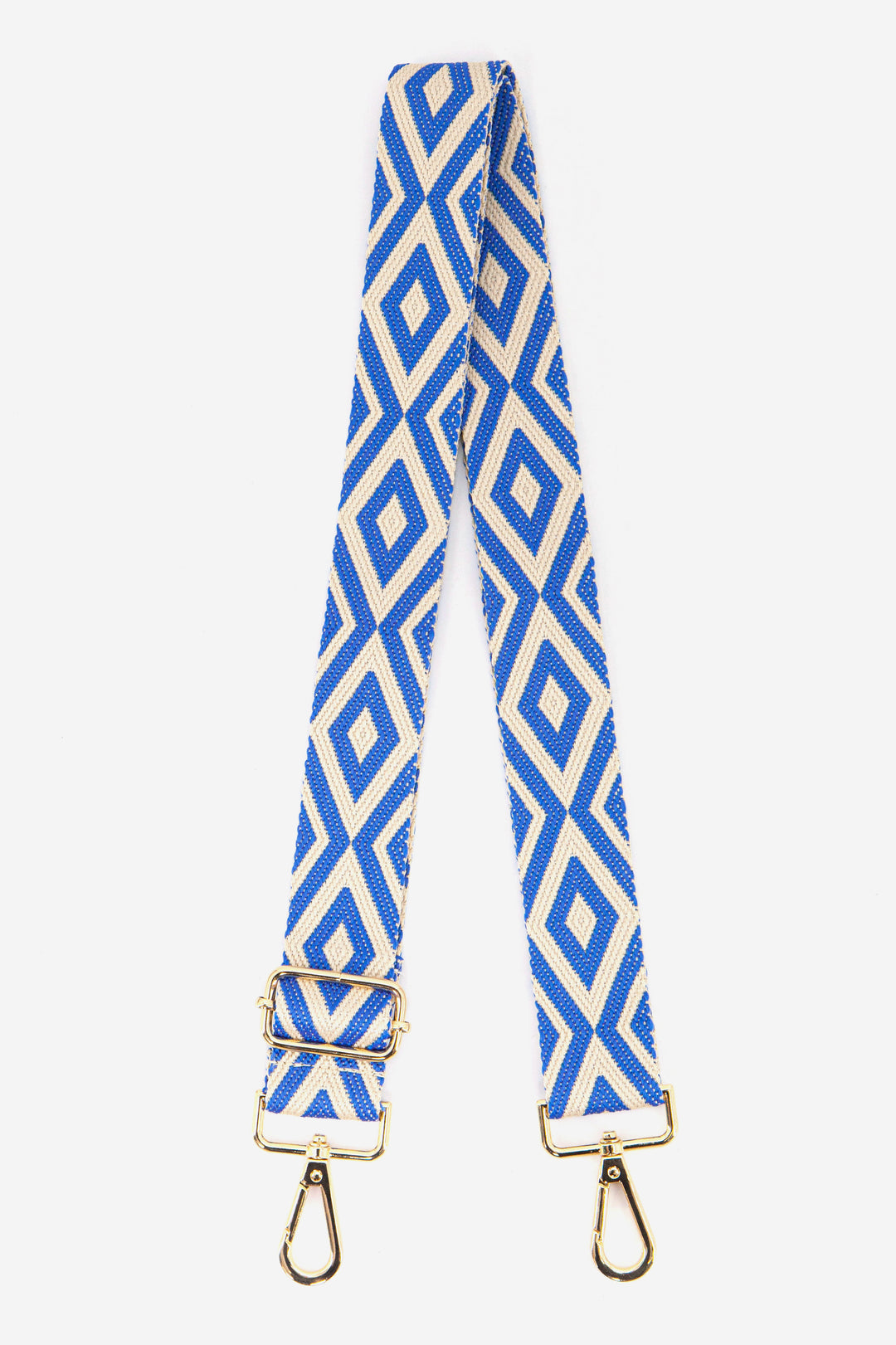 blue and white ikat pattern detachable bag strap with gold clip on snap hooks