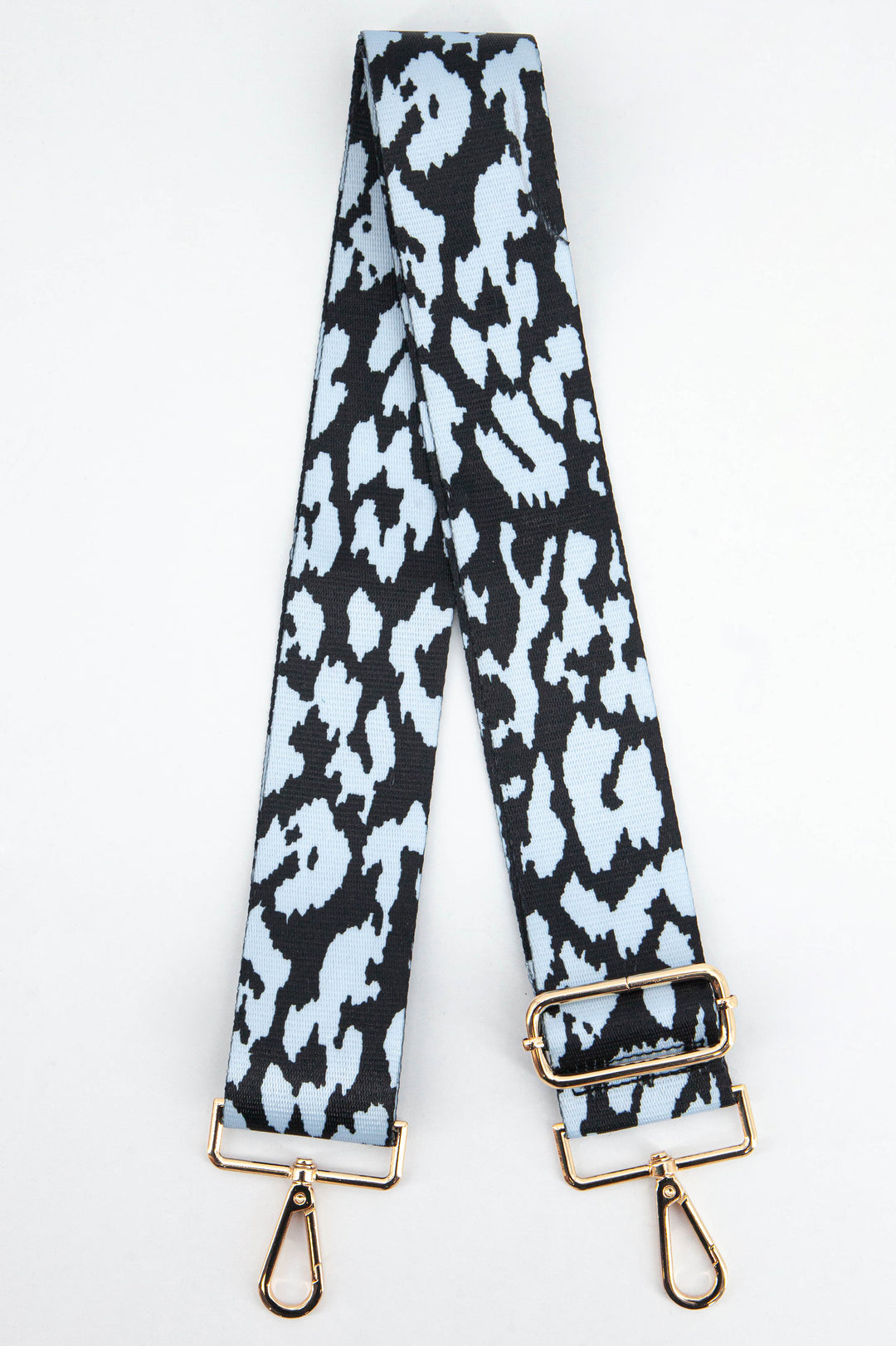 navy and light blue animal print bag strap with gold clip on snap hooks and adjustable buckle