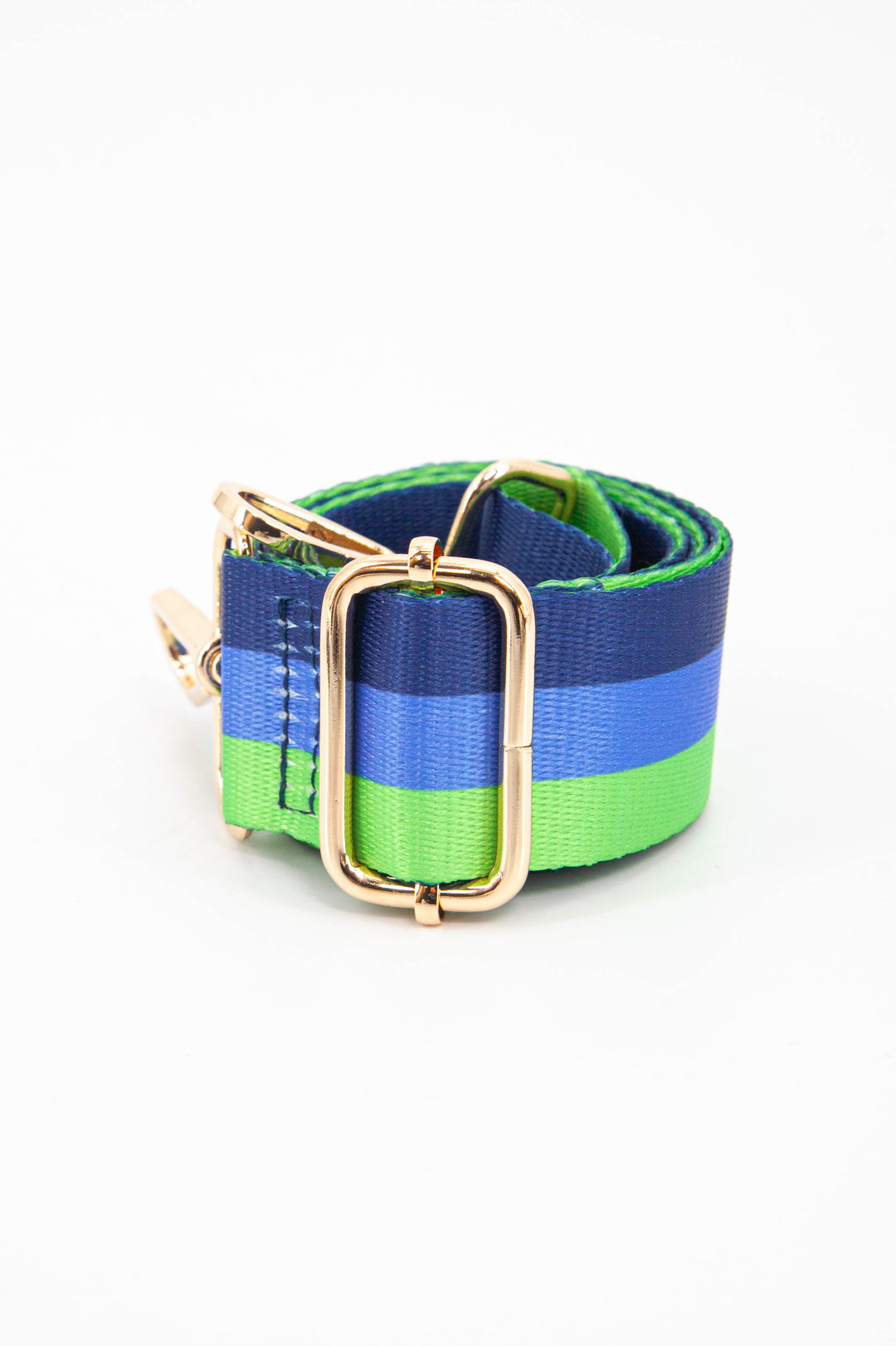 close up of the gold adjustable buckle and three contrasting stripes of green, blue and navy 